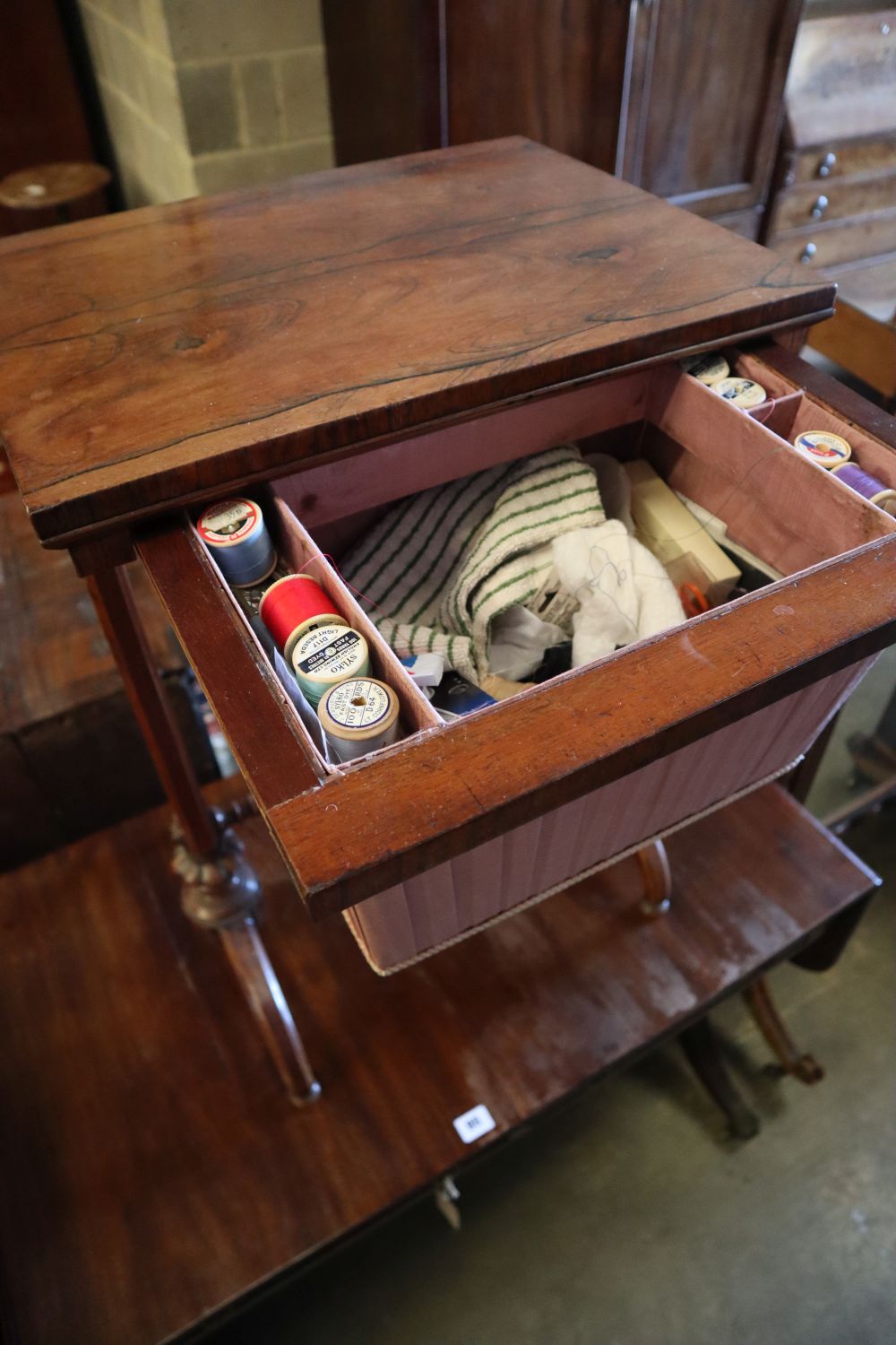 An early Victorian rosewood work table, width 48cm